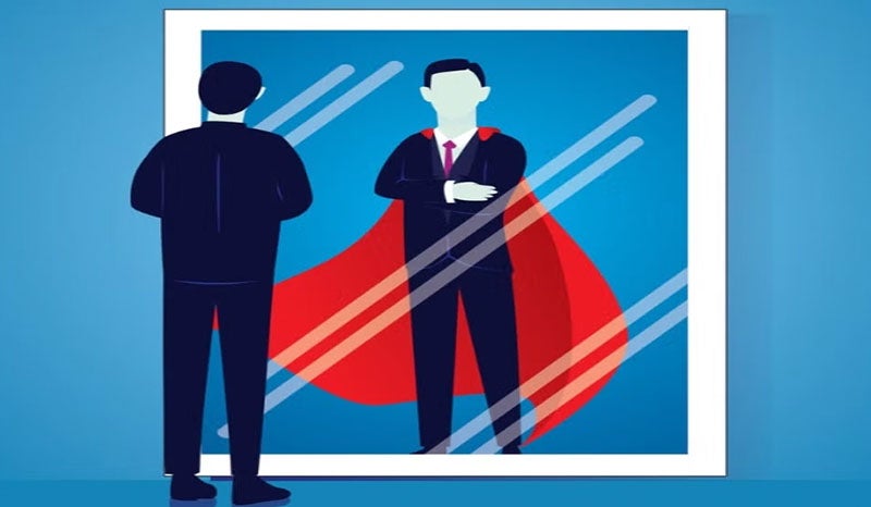 An illustration of a person looking at a superhero reflection in a mirror.